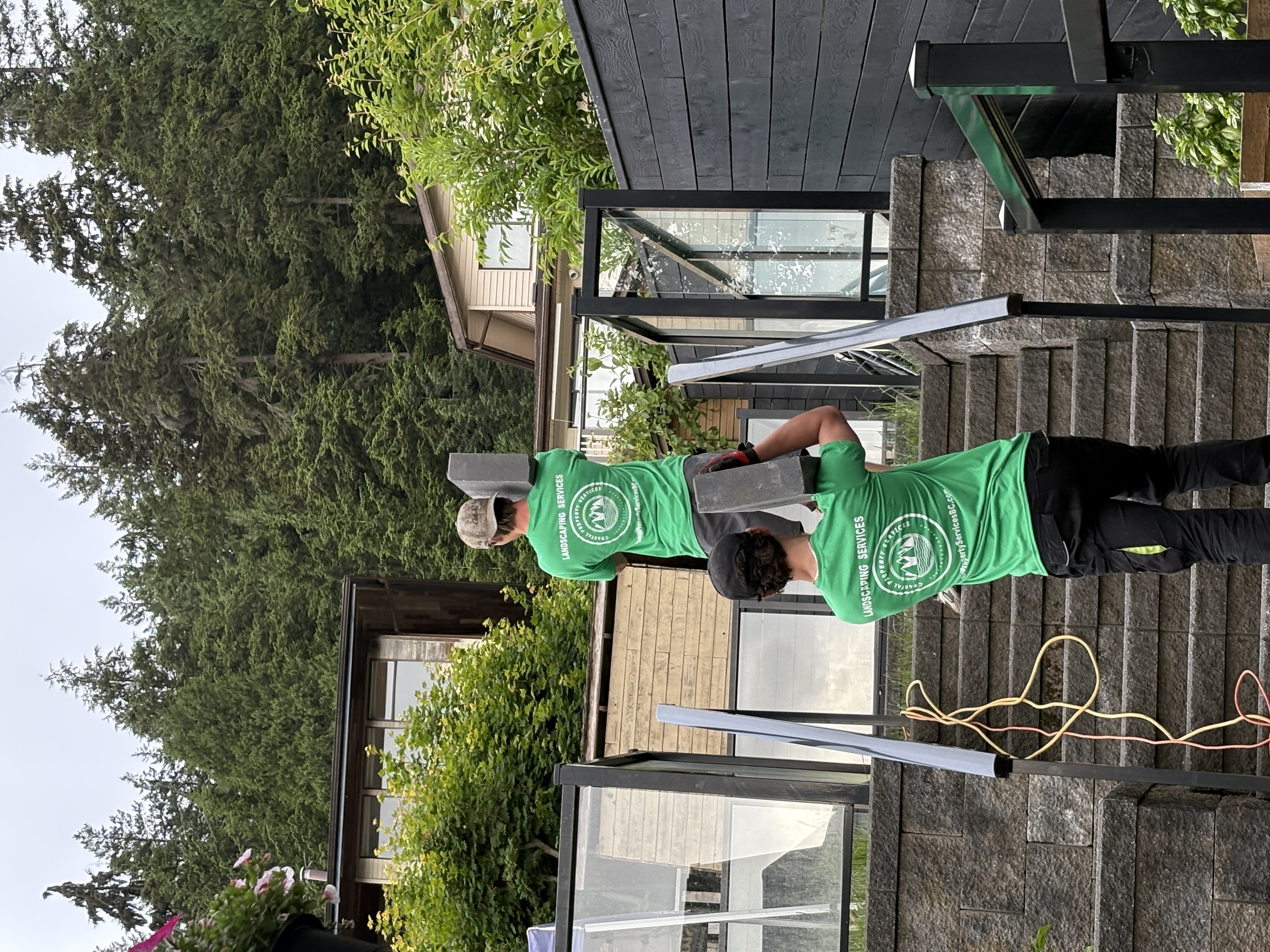 Coastal Property Services crew installing pavers on site in Metro Vancouver